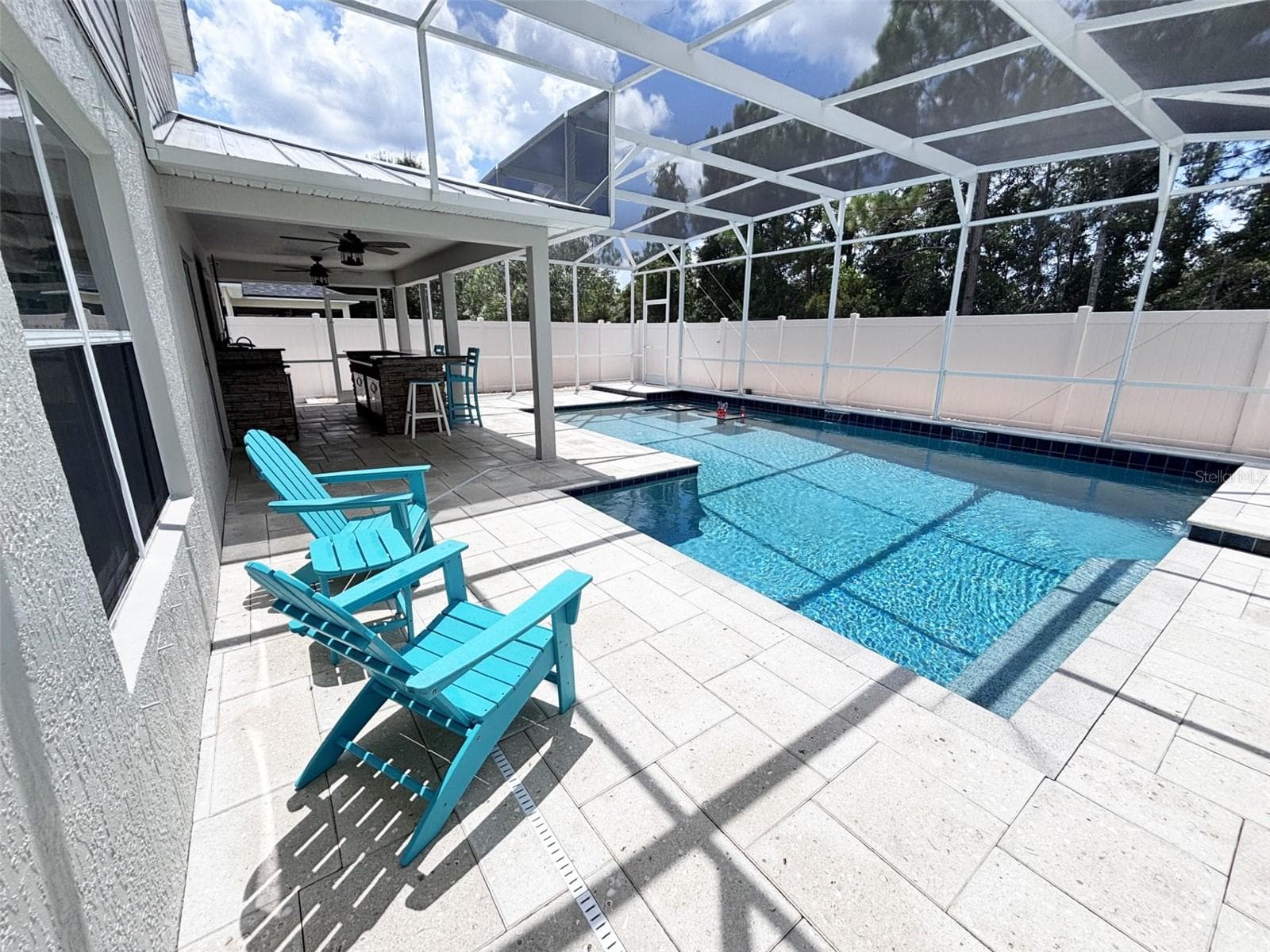 Screened pool patio view - 552 AEOLIAN DR, NEW SMYRNA BEACH