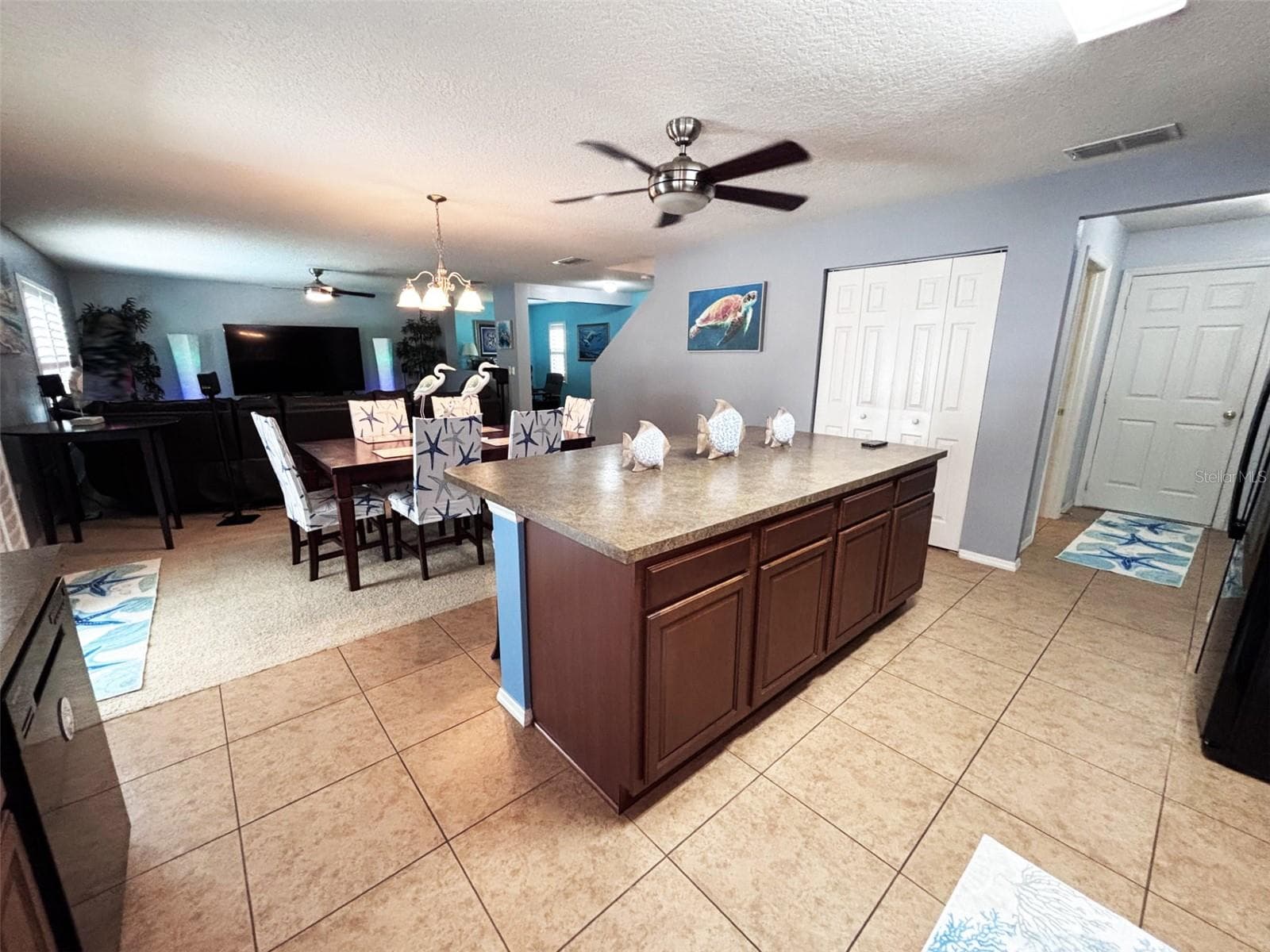 Island, dining room, living room - 552 AEOLIAN DR, NEW SMYRNA BEACH