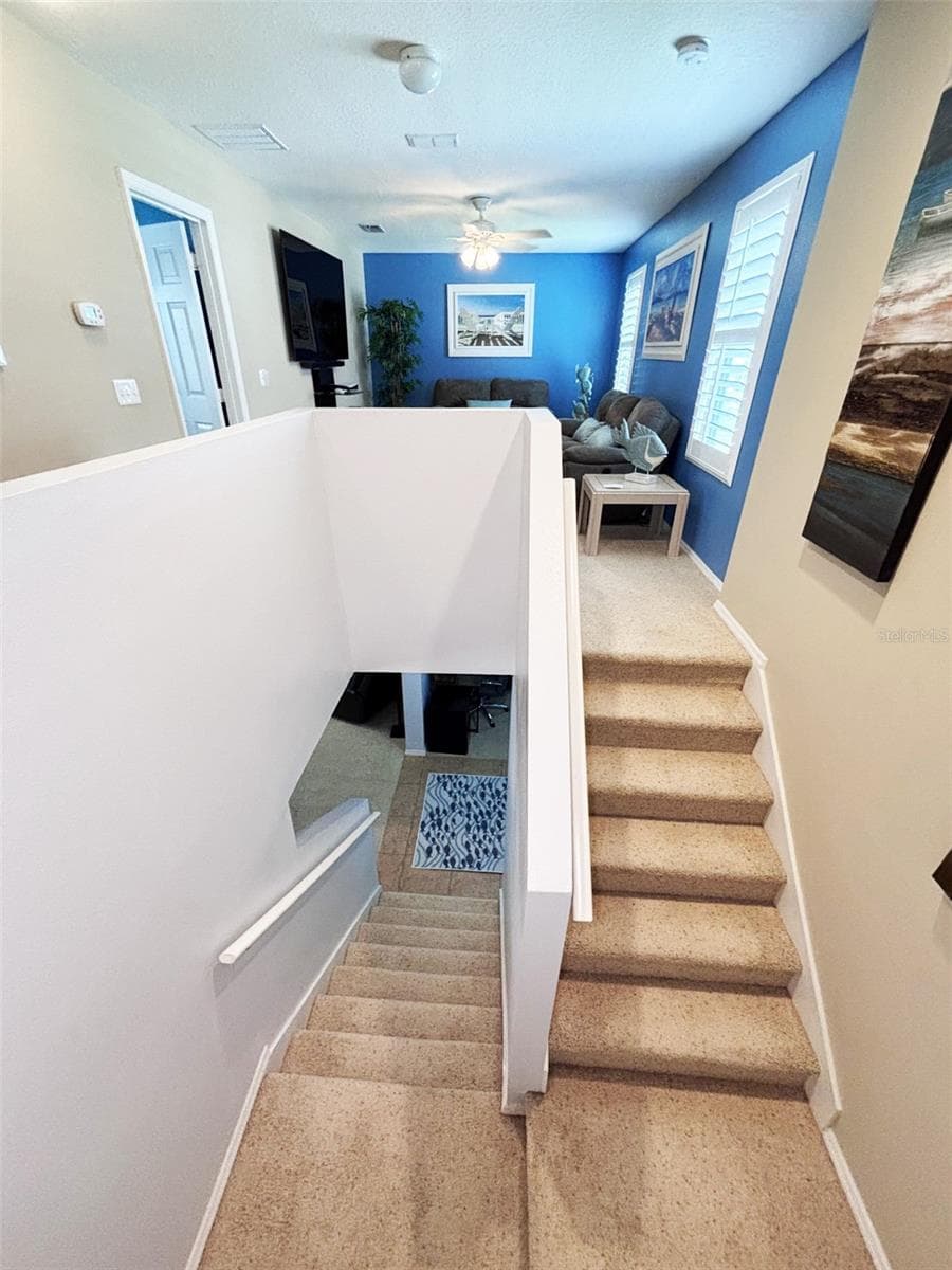 Stairs to loft - 552 AEOLIAN DR, NEW SMYRNA BEACH