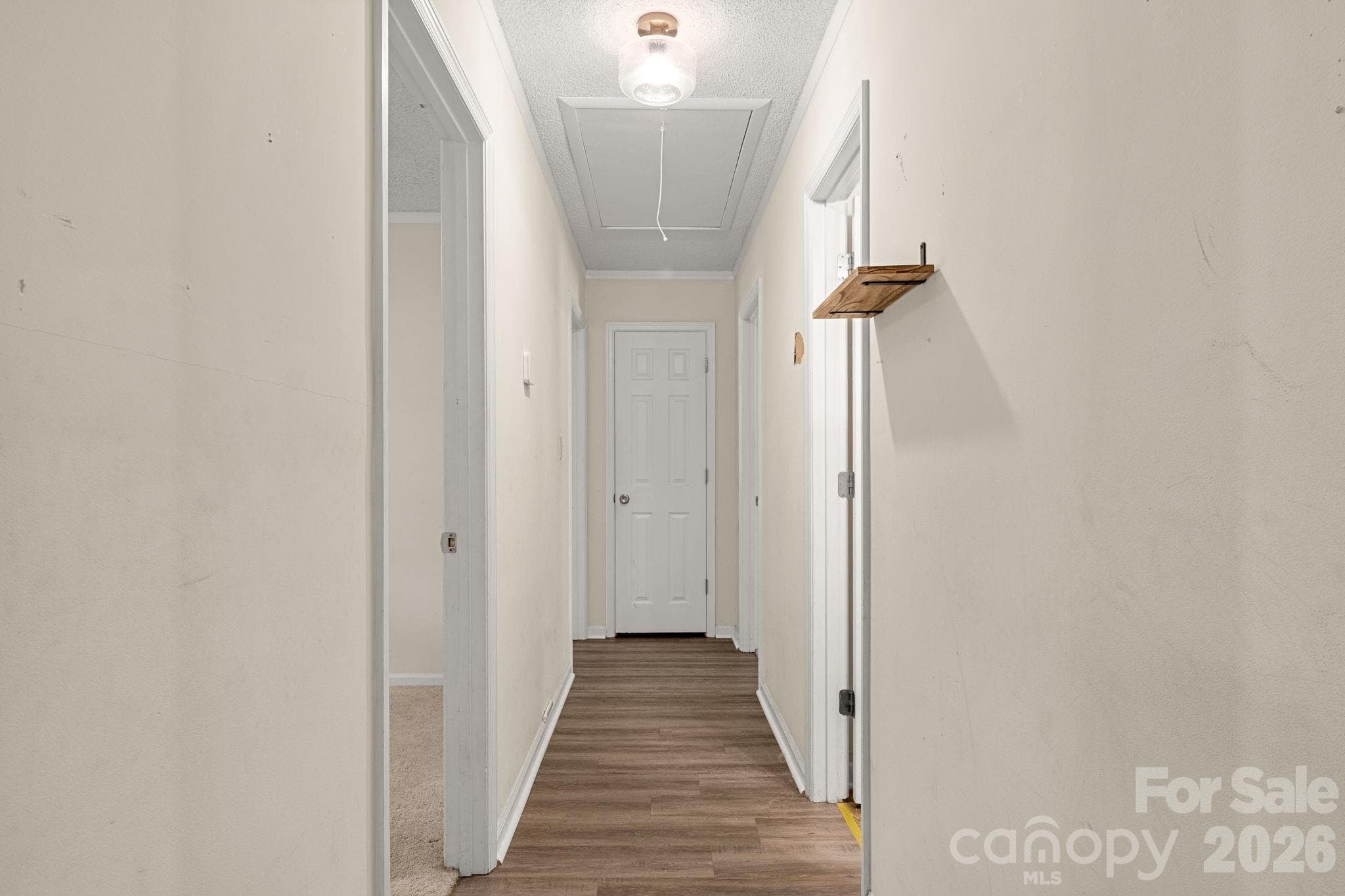 Hallway leading to bedrooms and linen closet - 1820 Bridgewood Drive, Lancaster