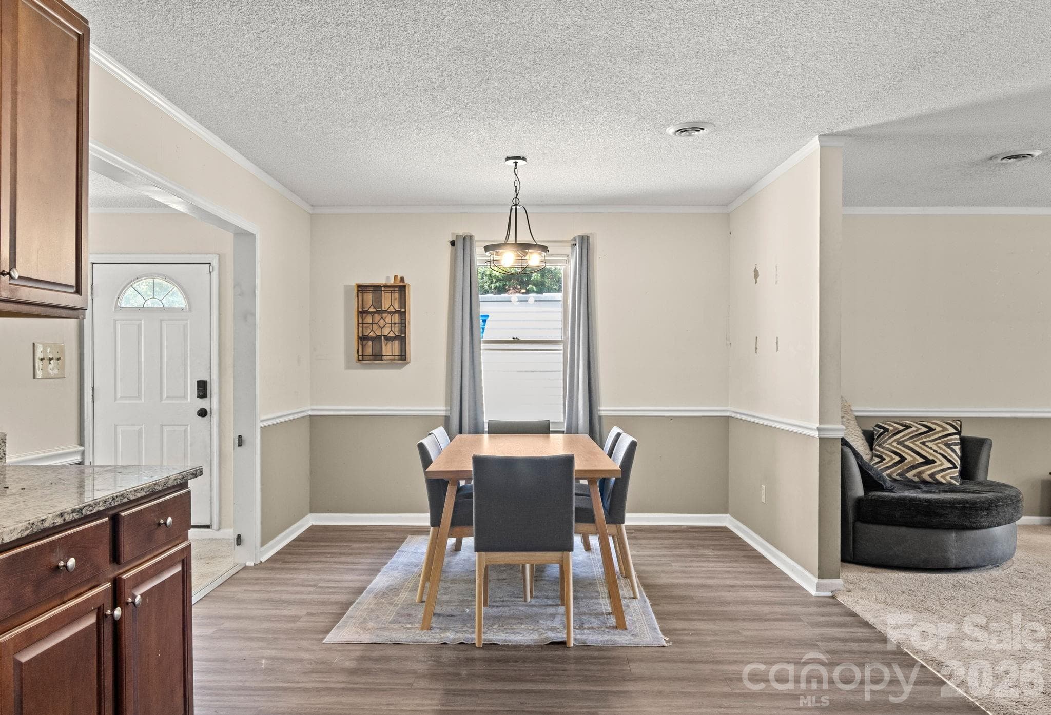 Dining area with new light fixture - 1820 Bridgewood Drive, Lancaster