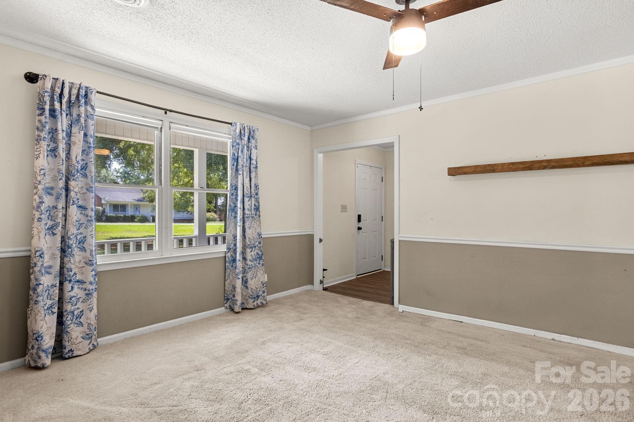 Living Room with double window and view into foyer - 1820 Bridgewood Drive, Lancaster
