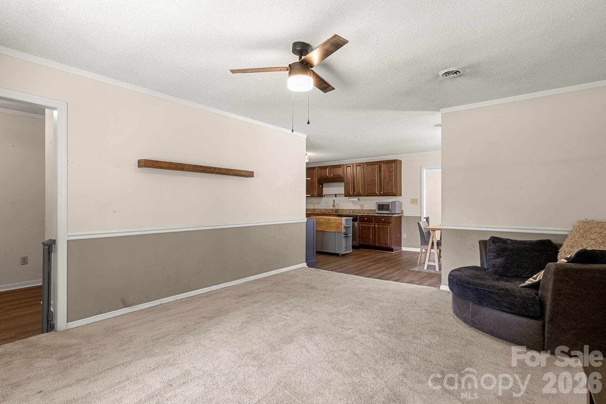 Living Room with view into dining area and kitchen - 1820 Bridgewood Drive, Lancaster