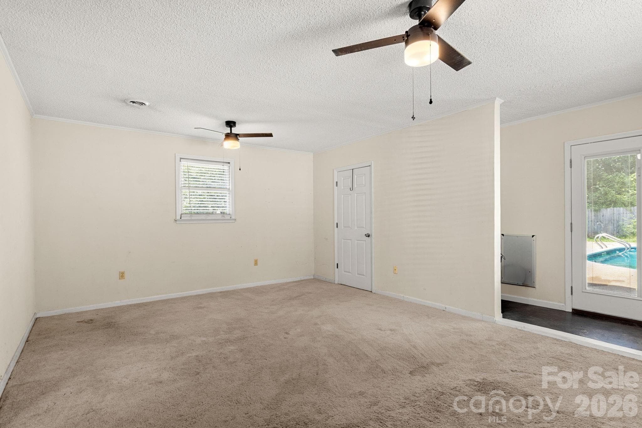 Bonus Room with large utility closet and doors to pool and backyard - 1820 Bridgewood Drive, Lancaster