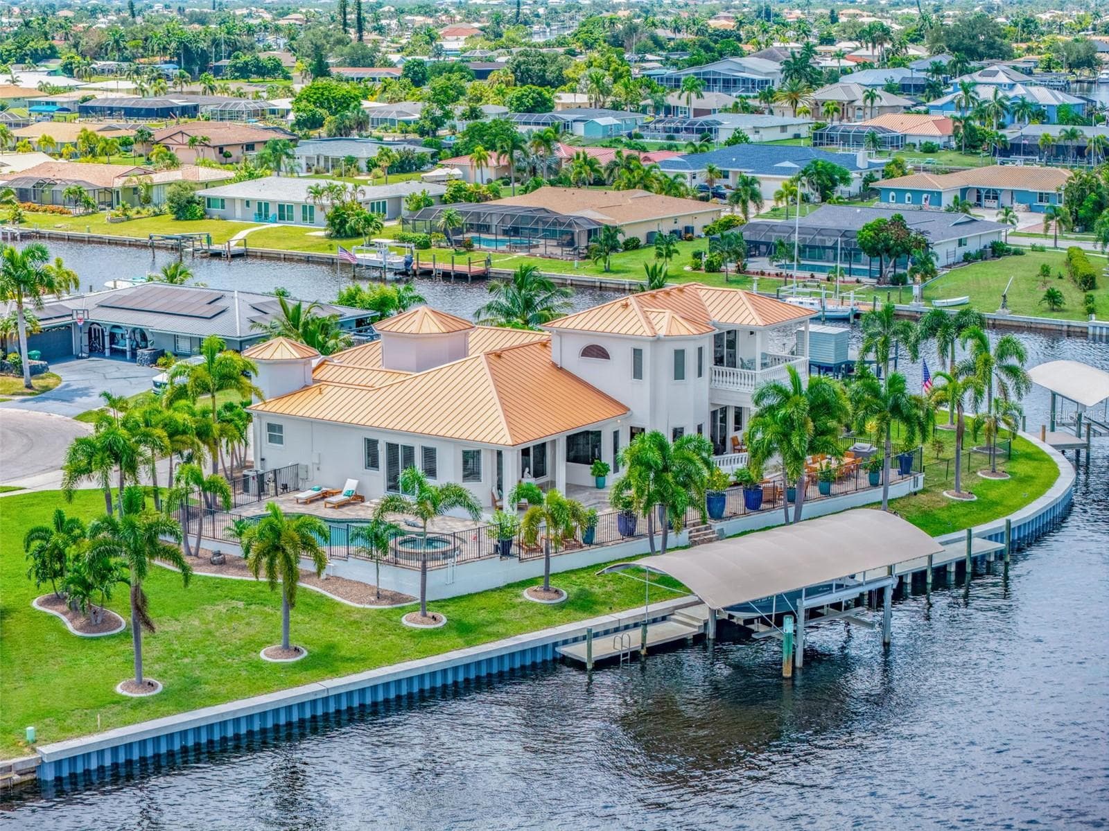 Stunning Aerial Highlighting Pool, Outdoor Living Areas and Waterfront Access - 290 TAIT TER SE, PORT CHARLOTTE