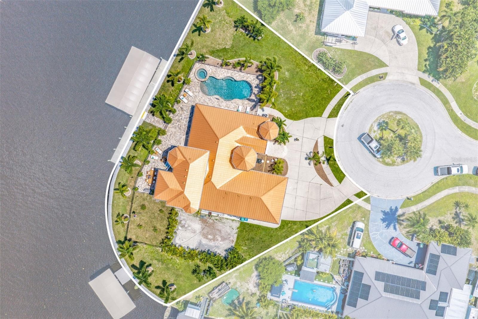 Birds Eye View Showcasing the Exceptional 260 Foot Waterfront Tip Lot - 290 TAIT TER SE, PORT CHARLOTTE