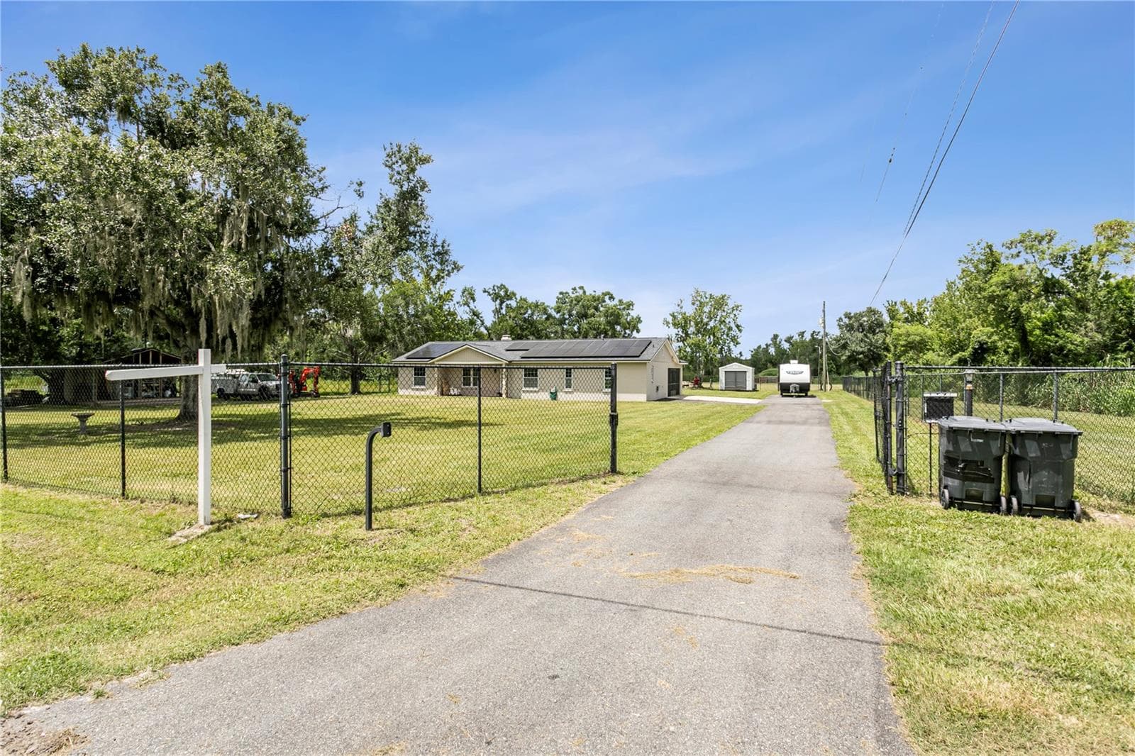 Fully fenced with gated entry - 10710 BILL TUCKER RD, WIMAUMA