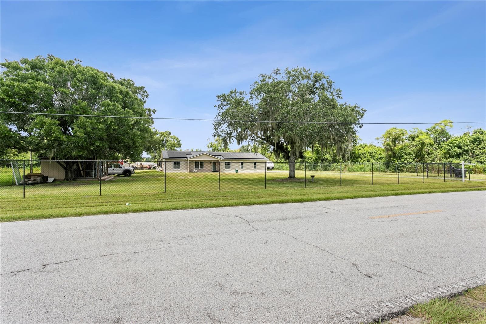 View of the home from the road - 10710 BILL TUCKER RD, WIMAUMA