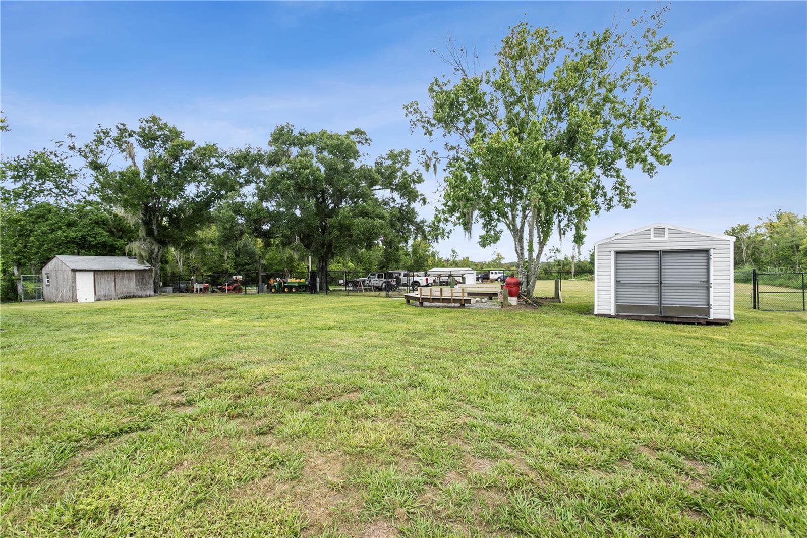 Fire pit and two outbuildings - 10710 BILL TUCKER RD, WIMAUMA