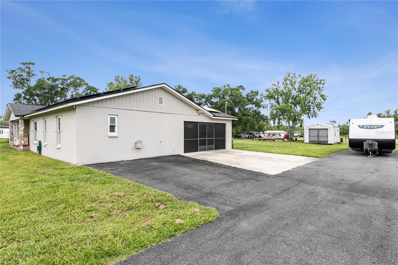 The approach to the home from the driveway - 10710 BILL TUCKER RD, WIMAUMA