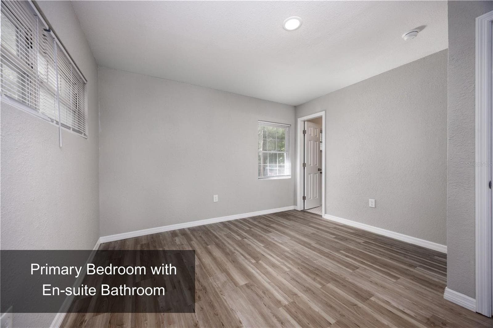 Primary Bedroom with En-suite Bathroom - 640 NW 36TH TER, GAINESVILLE