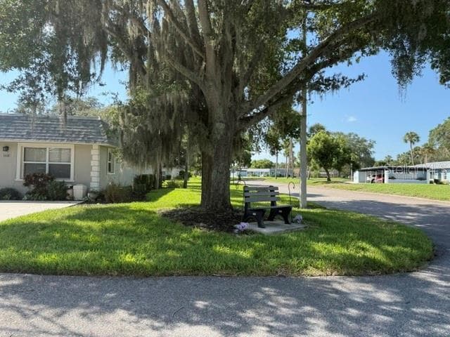 Quiet bench for birdwatching. Community is well manicured. Drive through! - 3444 TROPHY BLVD, NEW PORT RICHEY
