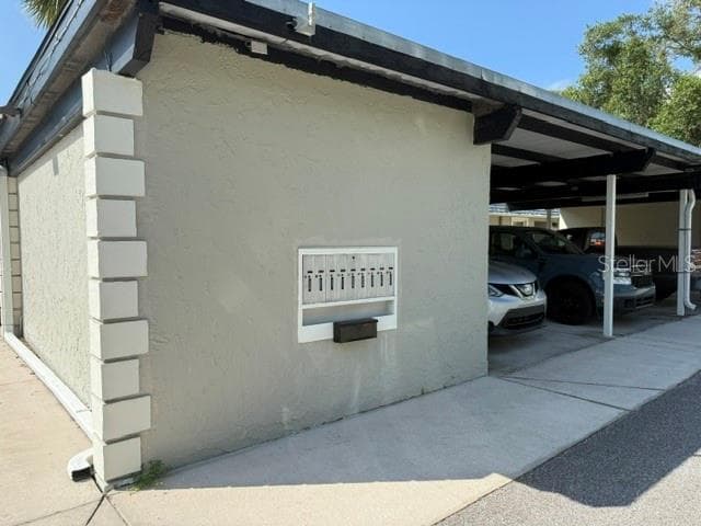 Covered parking. Easy access to your mail box. Just steps to your front door. No stairs. NO UPPER units. One level building - 3444 TROPHY BLVD, NEW PORT RICHEY