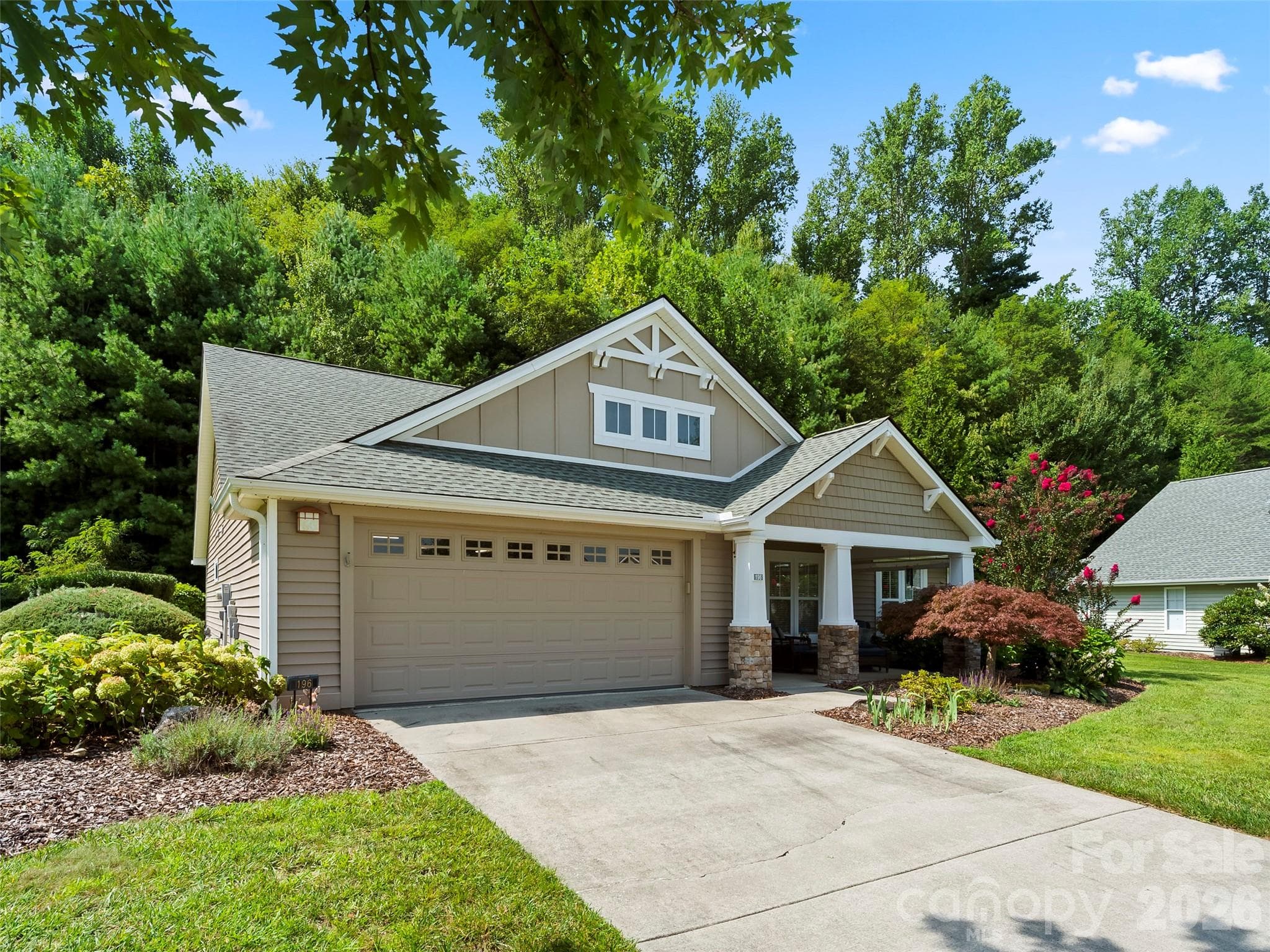 Spacious 2-Car Garage with built-in shelving - 196 Snowy Egret Way, Hendersonville