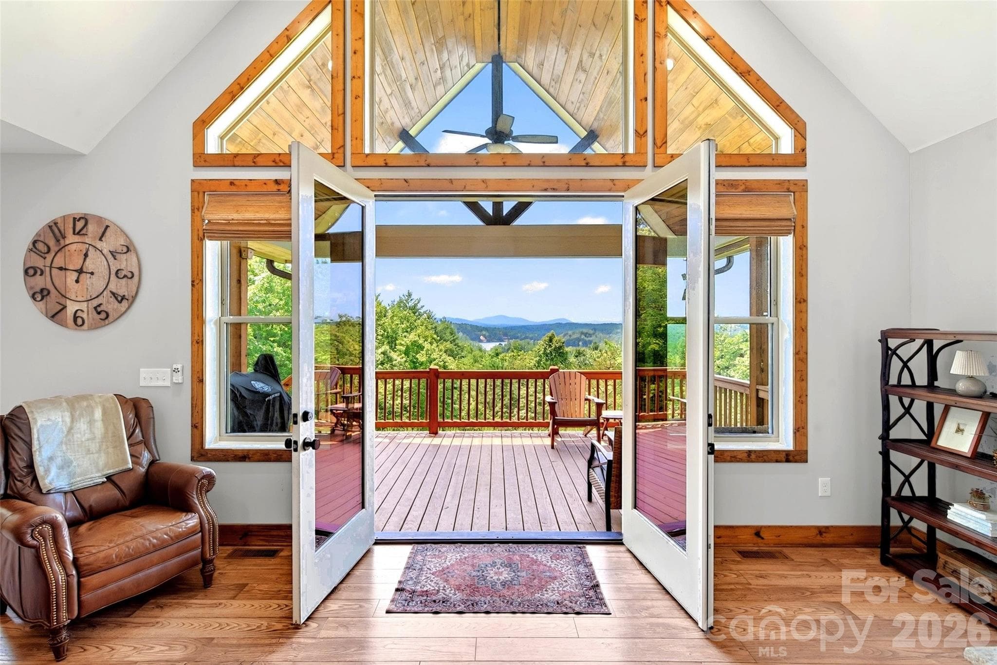 Open the great-room doors and the porch, the mountains, and Lake James are the whole view - Nebo