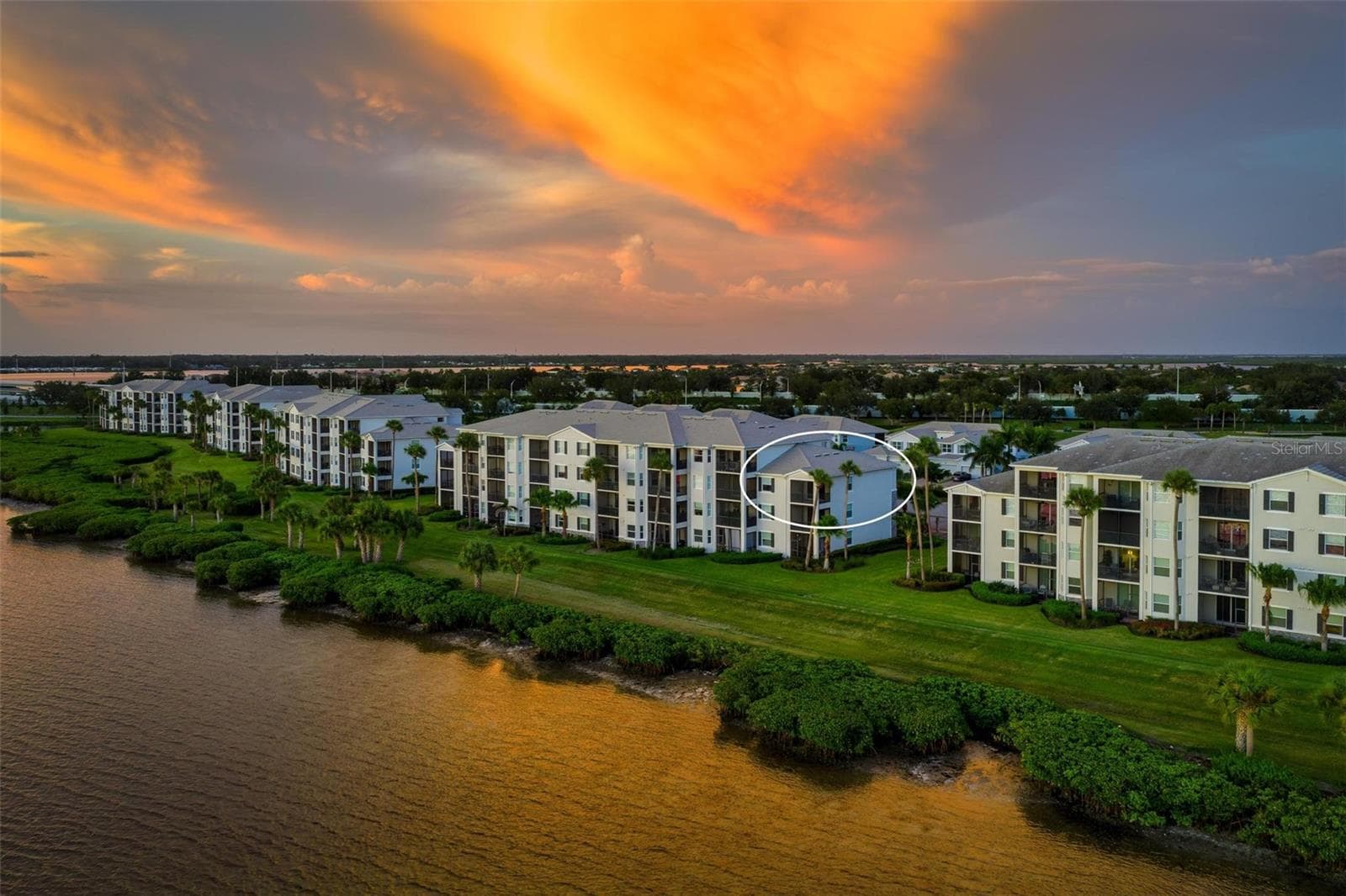 Building (from river view at sunset) - 920 TIDEWATER SHORES LOOP #301, BRADENTON