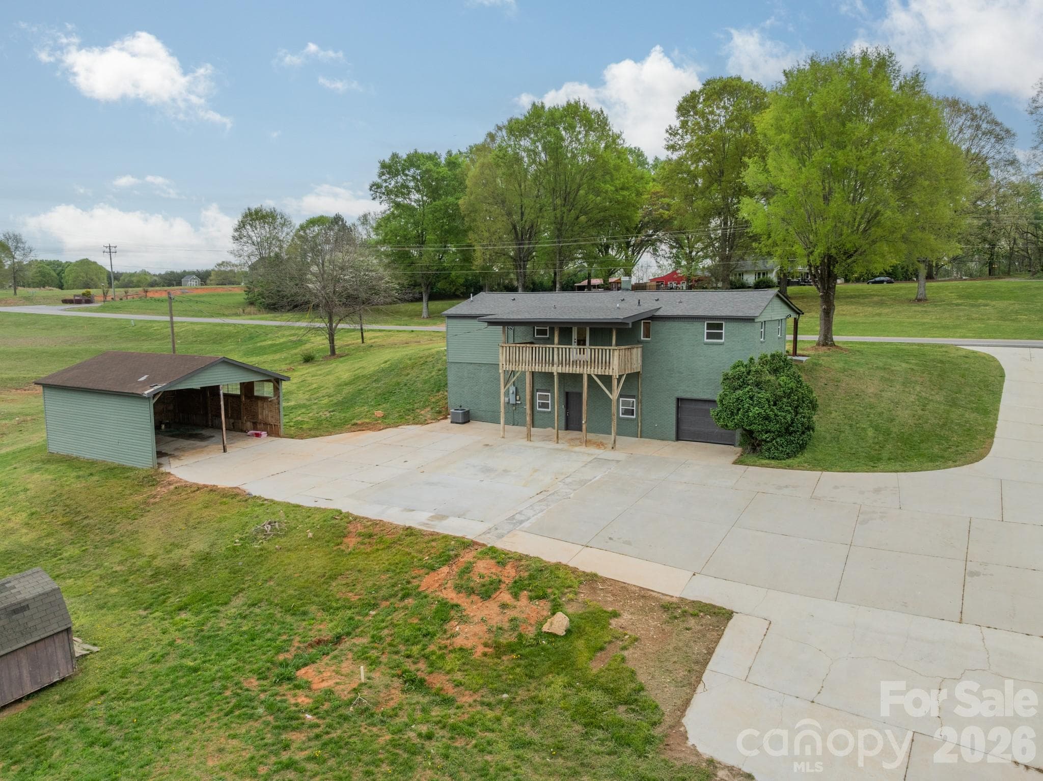 Rear View Basement Deck, Barn and Oversized Driveway - Newton