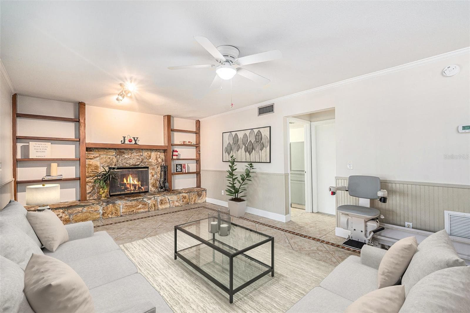 Family room with wood burning fireplace - 4611 LANDSCAPE DR, TAMPA