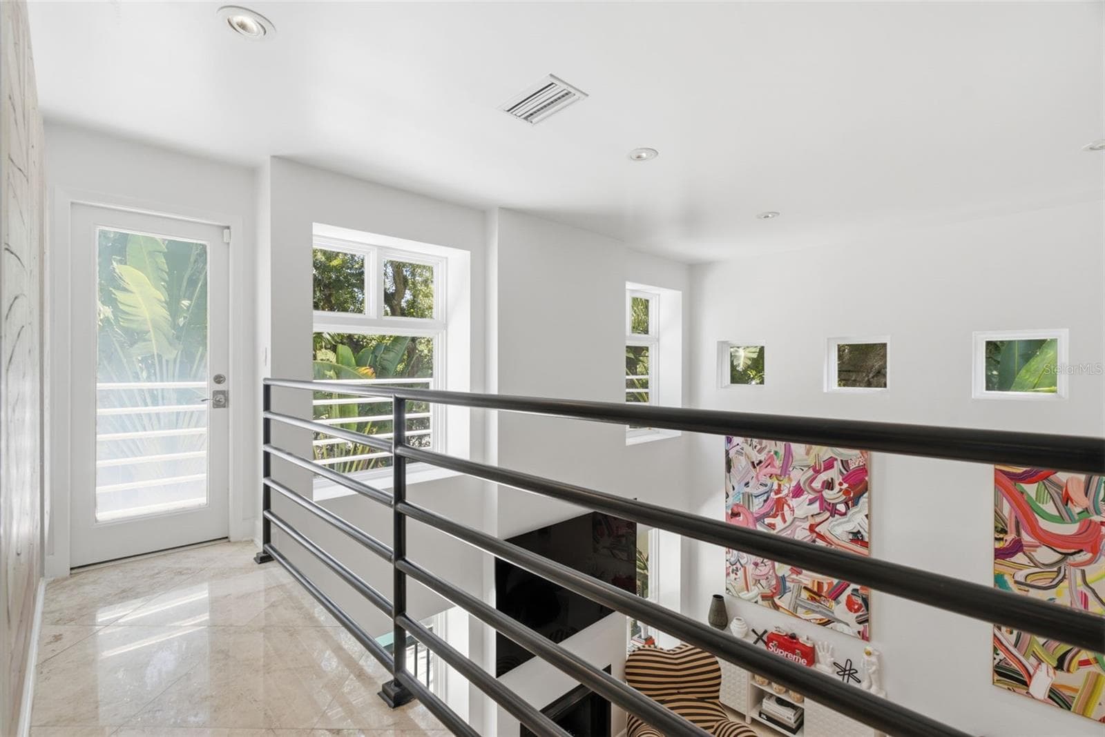 Upper landing to 2nd level balcony - 2701 CHAMBRAY LN, TAMPA