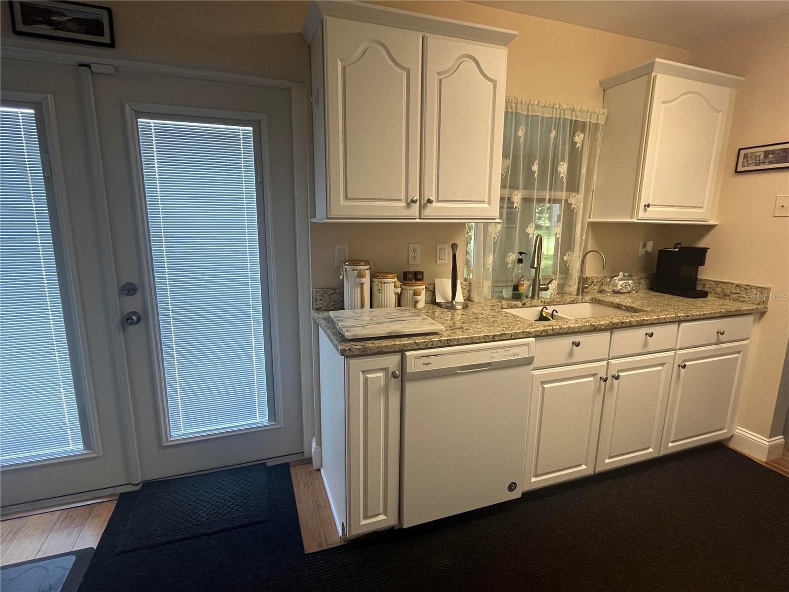 Kitchen w/french doors to out back - 11414 STANSBERRY DR, PORT RICHEY