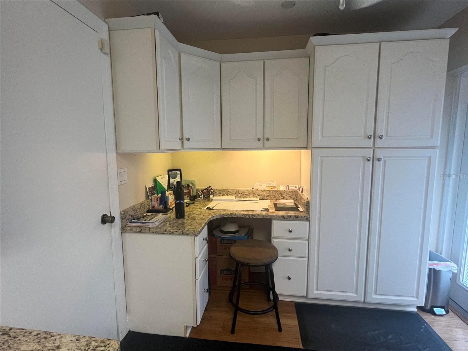 Kitchen w/built in desk and pantry - 11414 STANSBERRY DR, PORT RICHEY