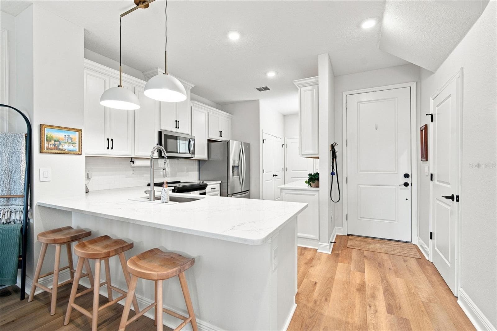 Layout has OPEN Kitchen instead of Galley that is found in larger units. - 5292 NEIL DR, ST PETERSBURG