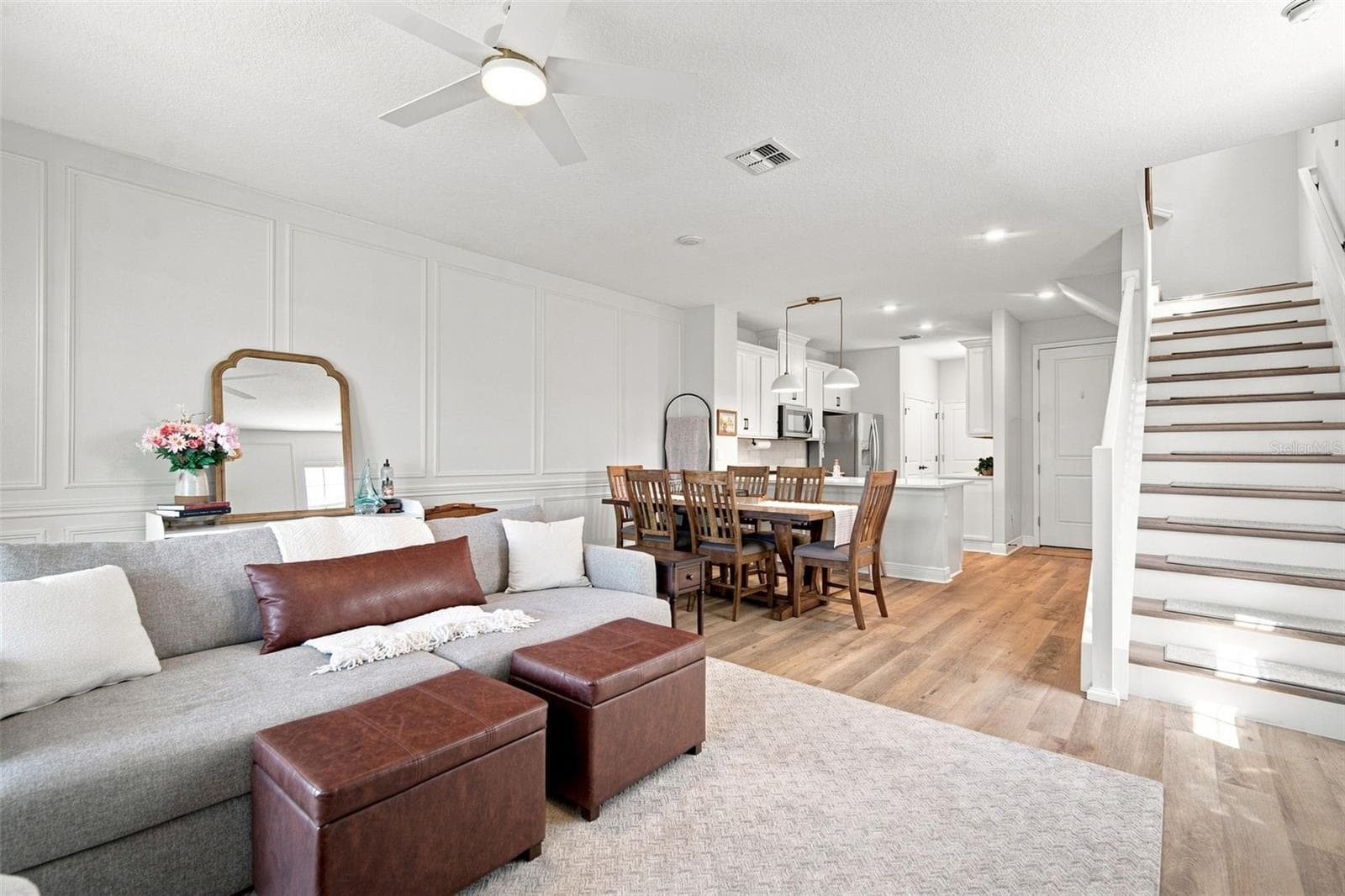 Luxury LVP Flooring runs continously up the stairs and on second floor. - 5292 NEIL DR, ST PETERSBURG