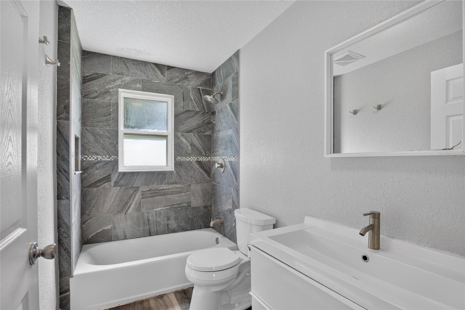 full bath - 4104 ORANGE AVE SE, HIGHLAND CITY