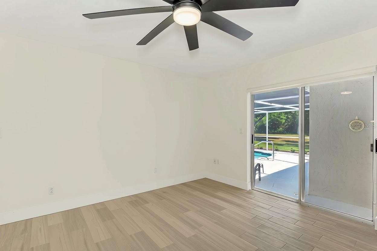 Primary with sliders out to pool - 1620 MISSION VALLEY BLVD, NOKOMIS