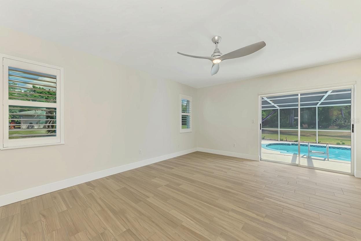 Third Bedroom with large slider out to pool - 1620 MISSION VALLEY BLVD, NOKOMIS