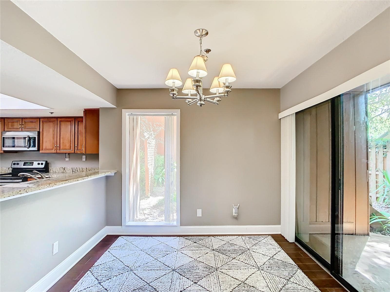 Dining area with glass door - 976 E MICHIGAN ST #A, ORLANDO