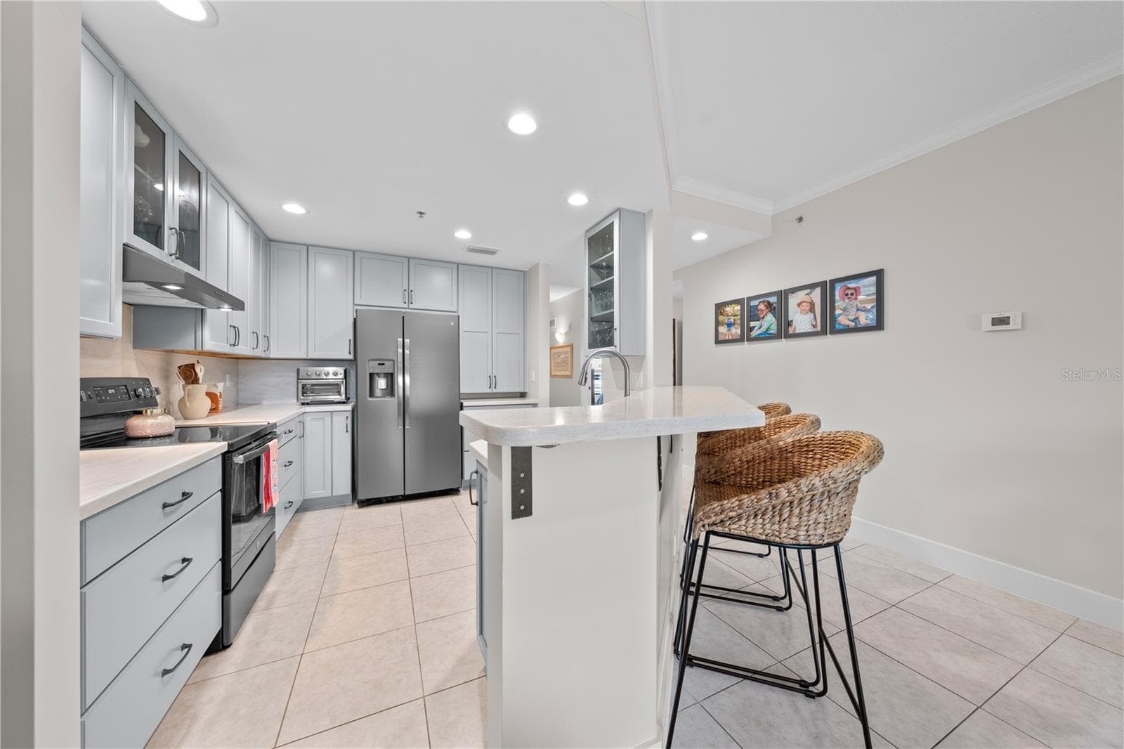 You will have plenty of space to make appetizers, dinner or cocktails in this well designed kitchen. - 13570 MYSTIC DR #102, SEBASTIAN