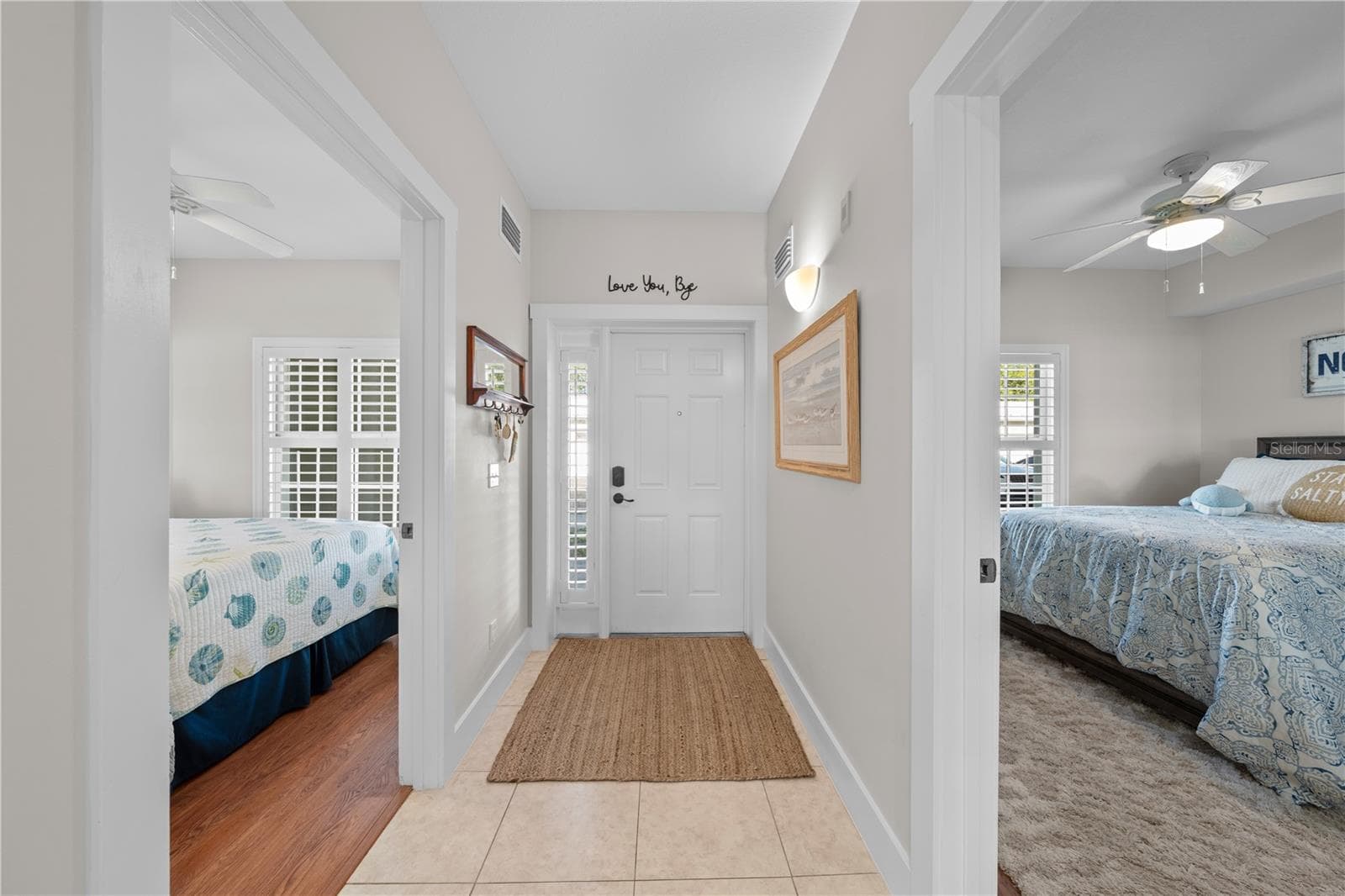 Interior view of the front door - bedroom #2 and bedroom #3 are separated nicely. - 13570 MYSTIC DR #102, SEBASTIAN