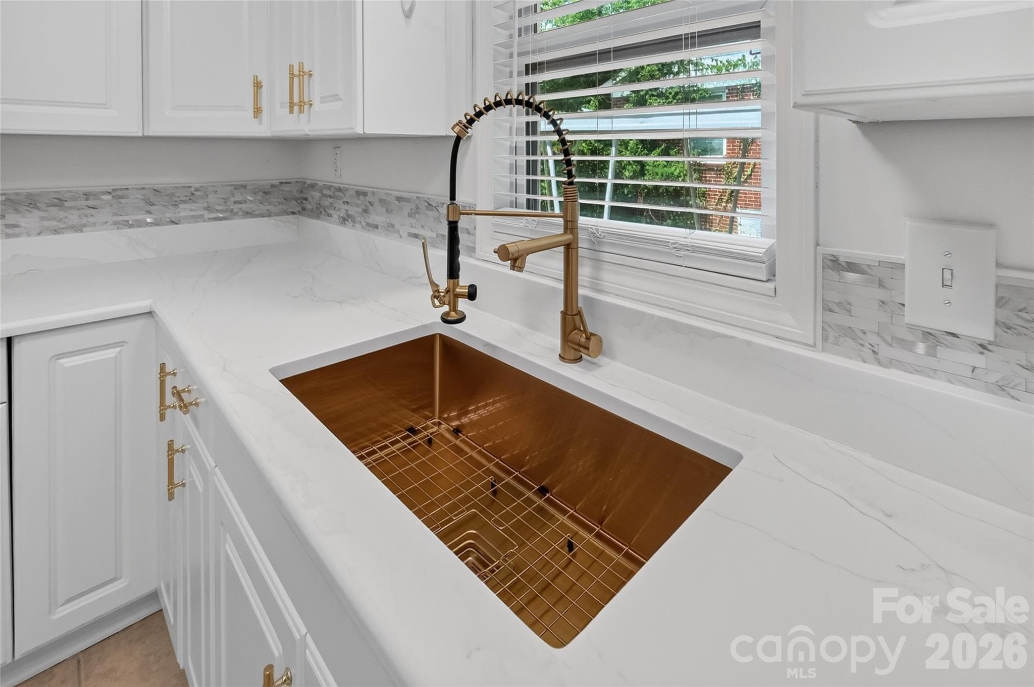 Gold sink and faucet - 1062 Dresden Drive W, Charlotte