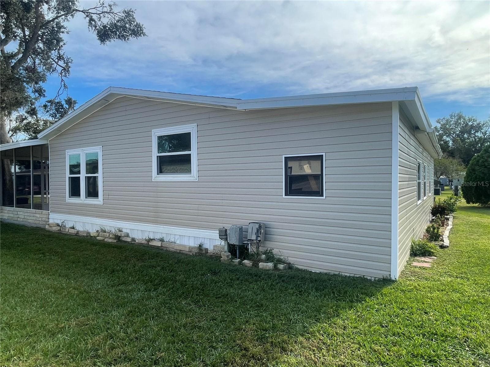 Mobile Home at 3145 HIDDEN LAKE DR, WESLEY CHAPEL, photo 4 of 25