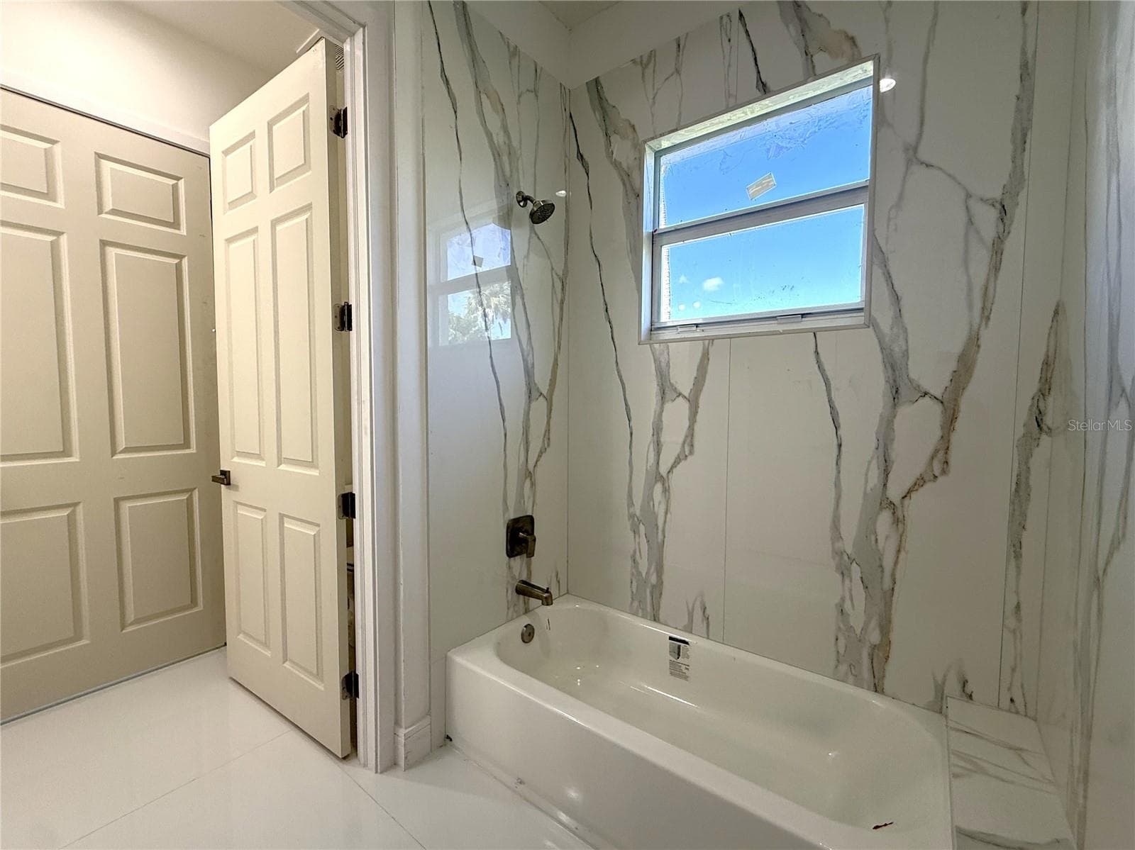 JACK AND JILL - 2ND BATHROOM - 16443 HILLSBOROUGH BLVD, PORT CHARLOTTE