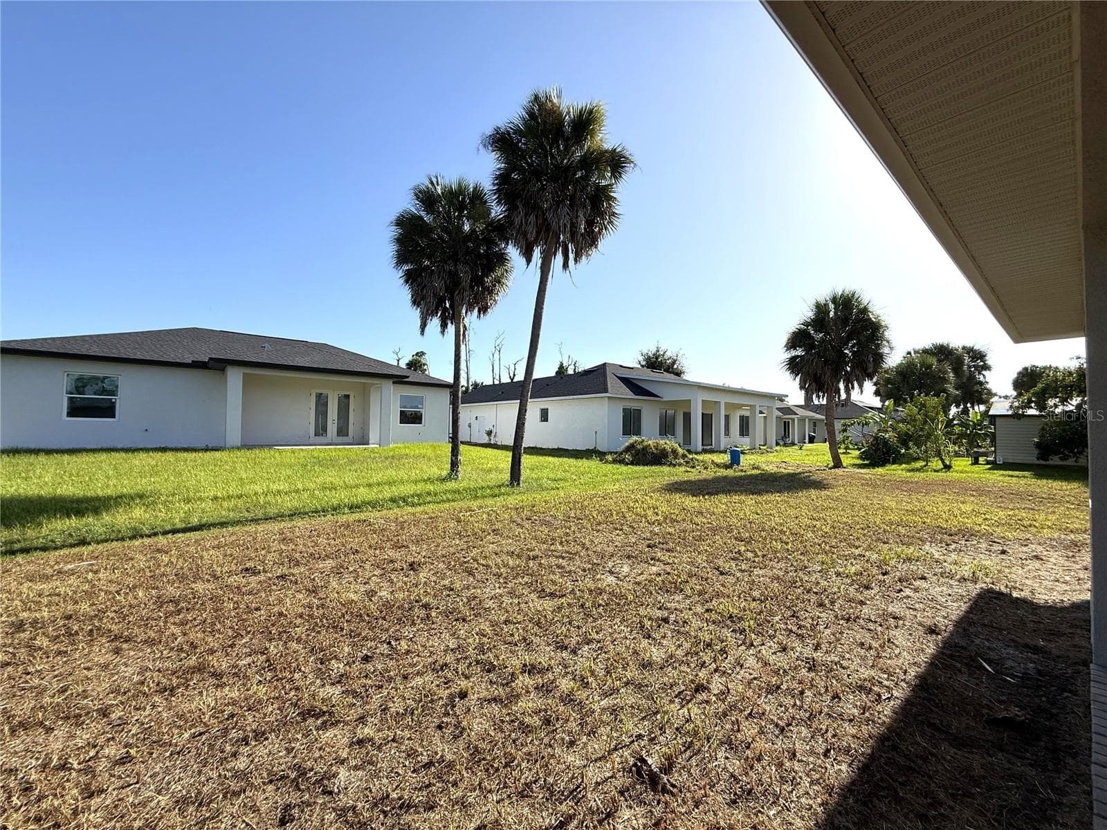 VIEW OF NEIGHBORS - 16443 HILLSBOROUGH BLVD, PORT CHARLOTTE