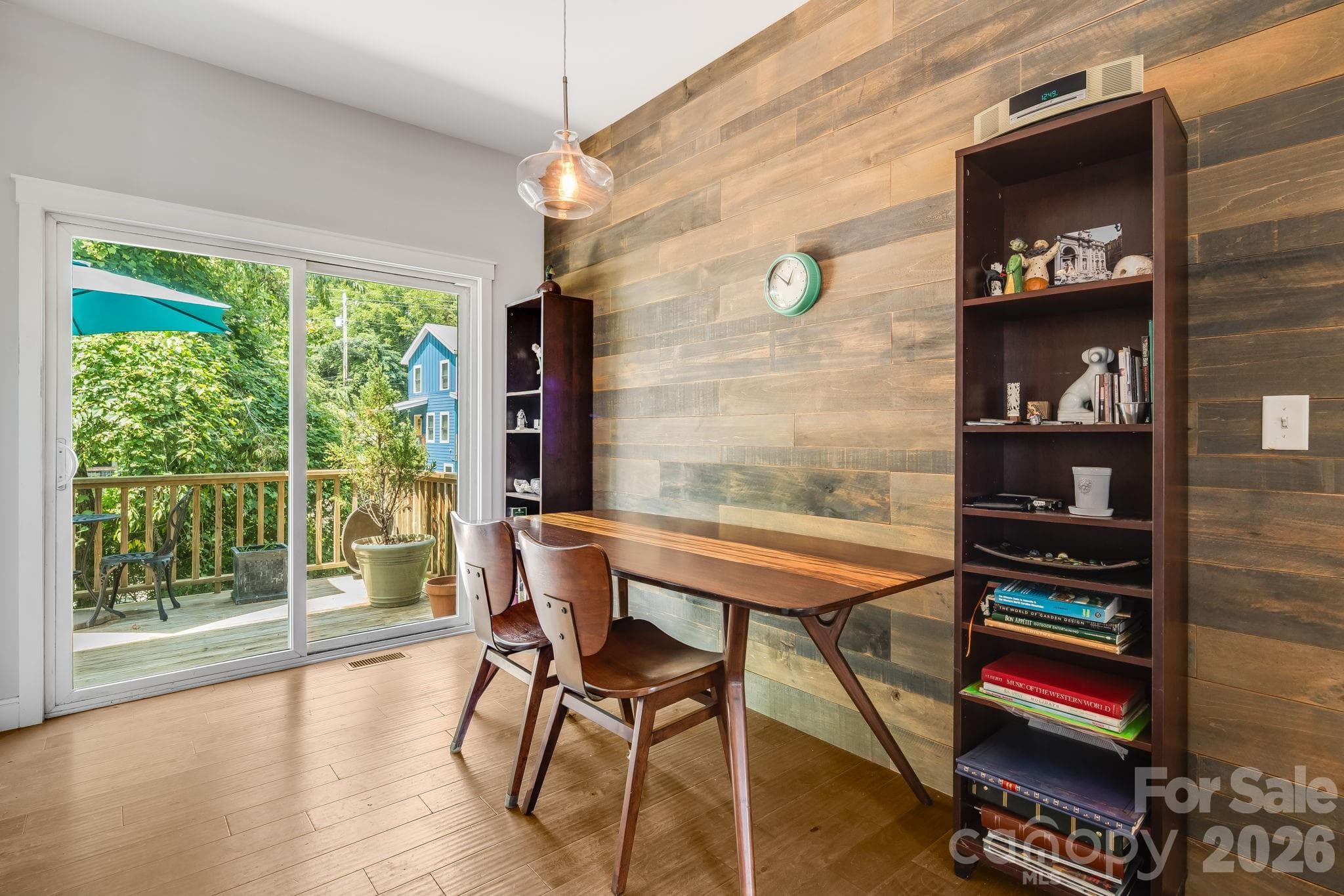 Sliding doors to the back deck with view of the creek. - 35 Emmett Lane, Asheville