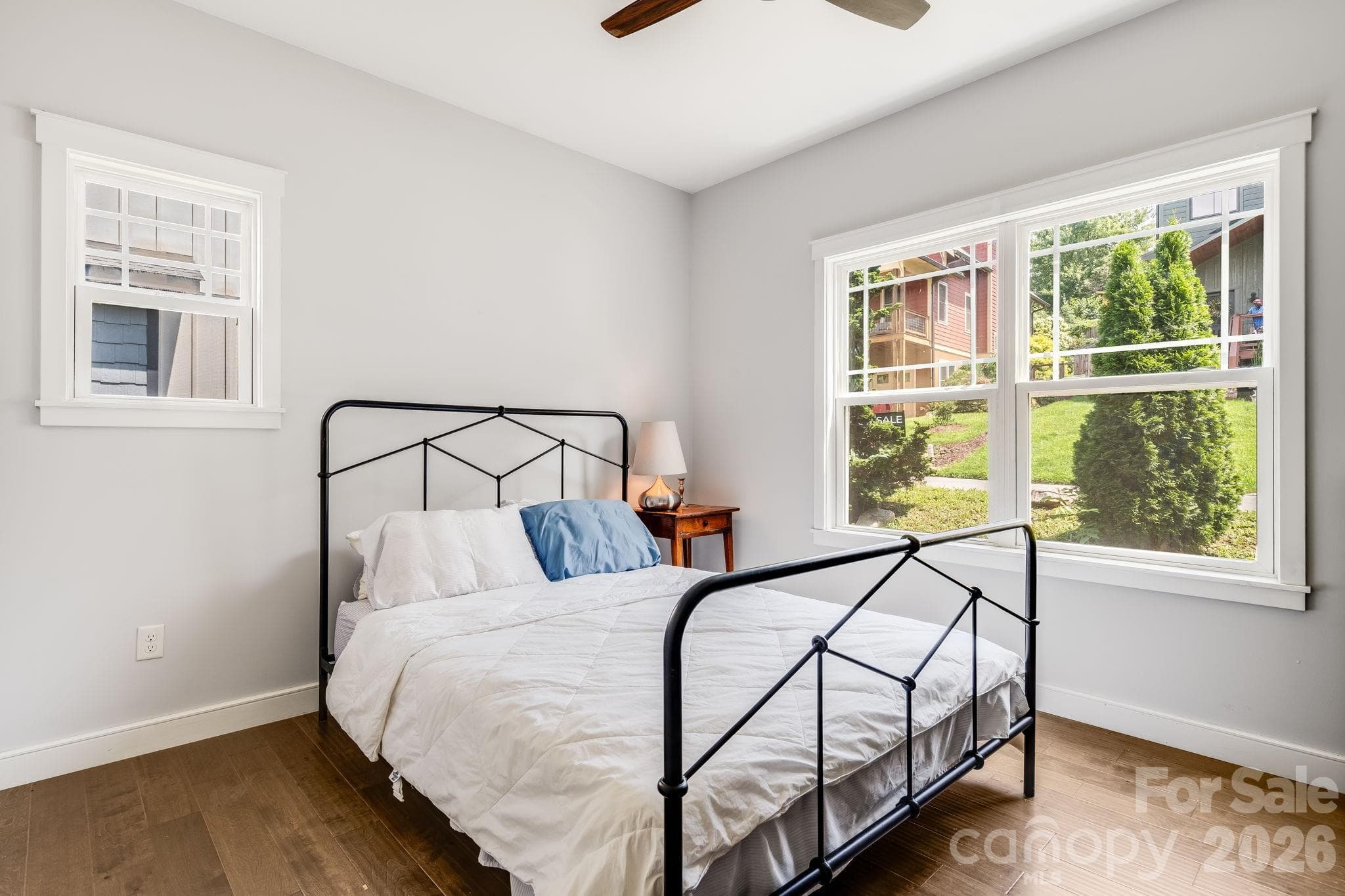 2nd guest room with plenty of windows that bathe the room in light. - 35 Emmett Lane, Asheville