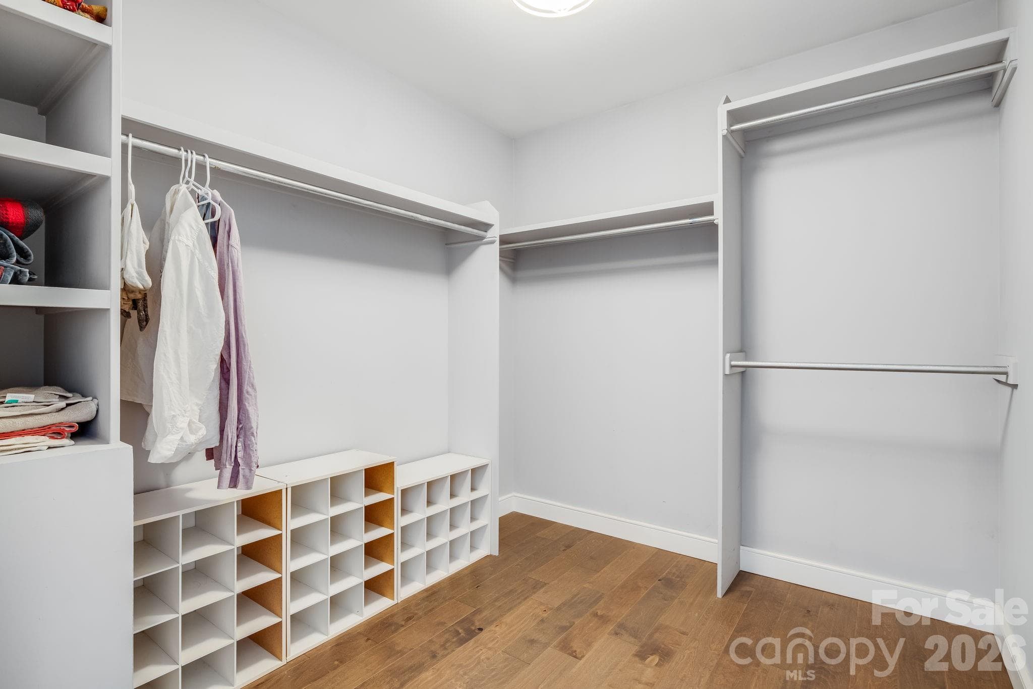 Large walk-in closet in the  primary suite. - 35 Emmett Lane, Asheville