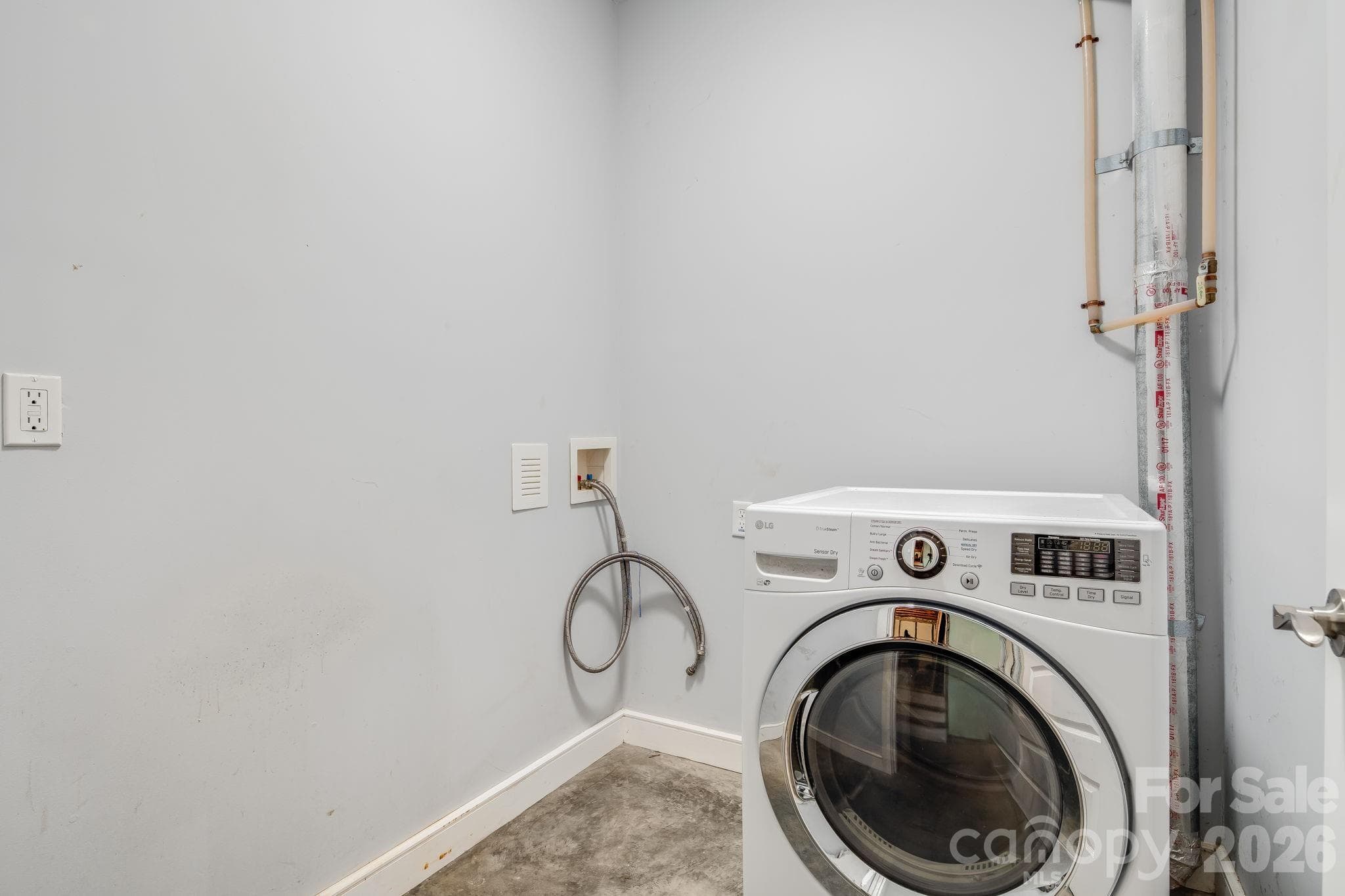 Laundry room in the lower level/basement. - 35 Emmett Lane, Asheville