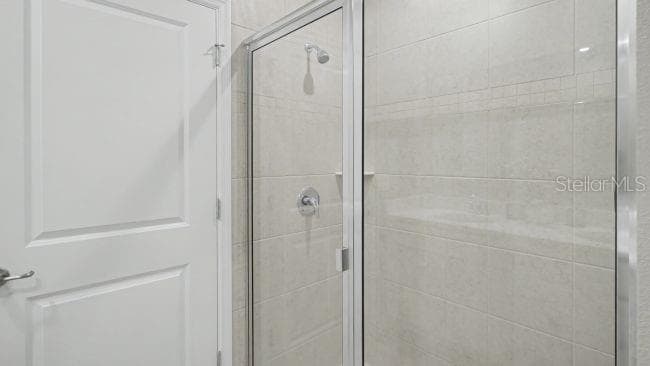 Primary Bathroom -Oversized shower with glass enclosure - 4144 SILKTREE CT, POINCIANA
