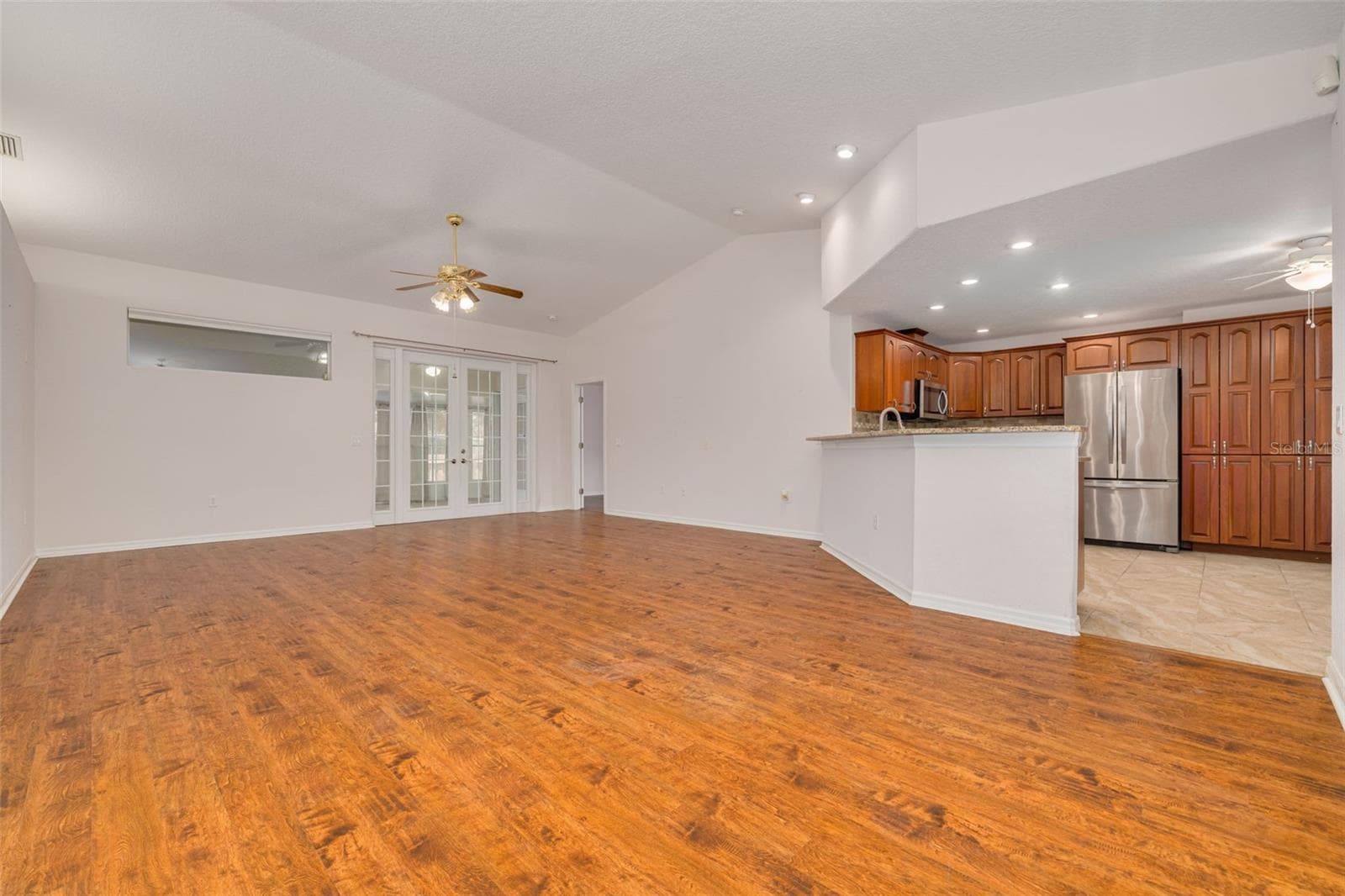 Living Room, Kitchen, Florida Room Doors view from Front Enctrance - 2102 BRADFORD ST, CLEARWATER