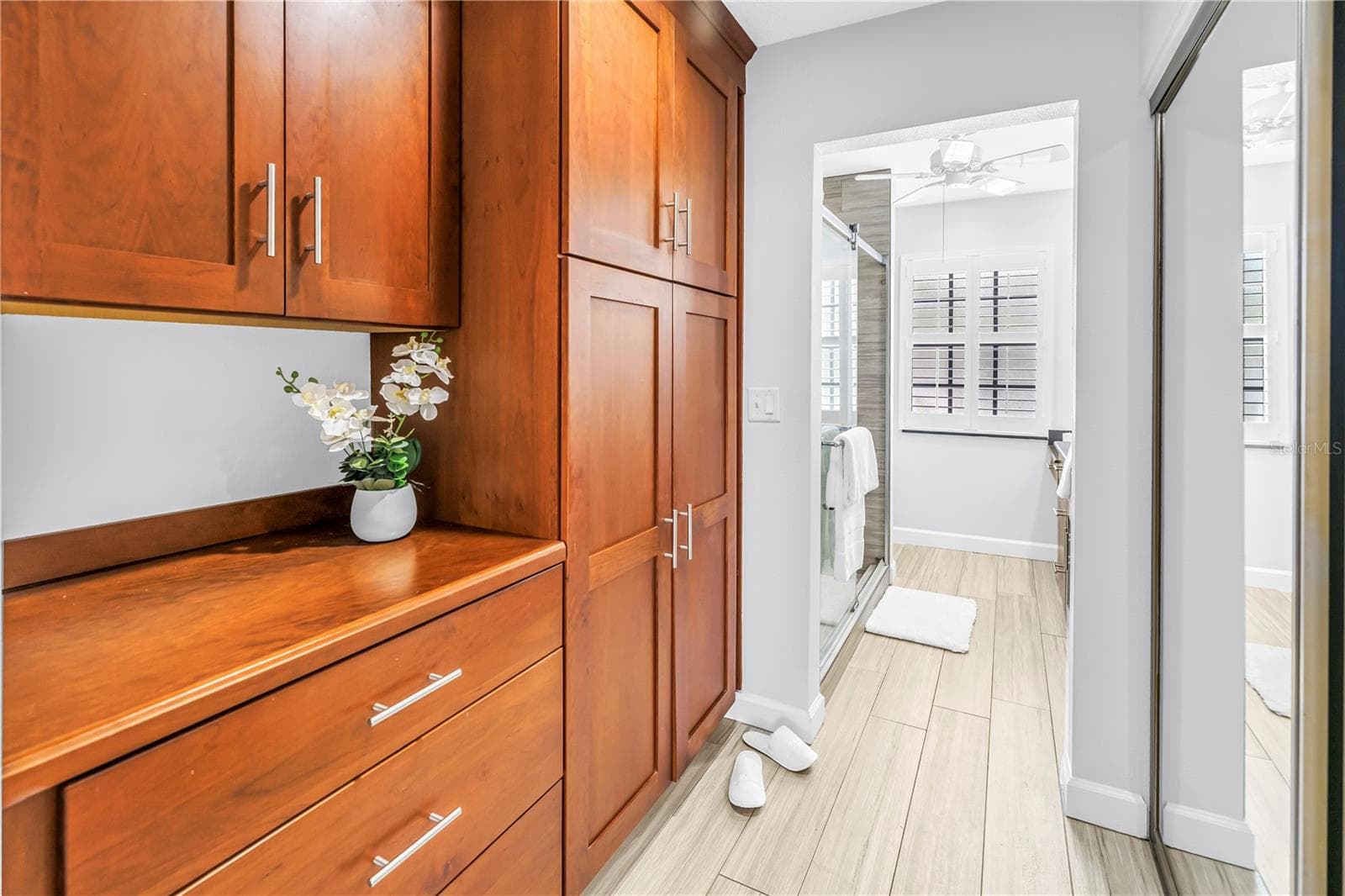 Primary en Suite Bath with Coffee Service area and beautiful Custom Cabinetry.  Great Storage! - 1092 SANABEL CT NE, ST PETERSBURG