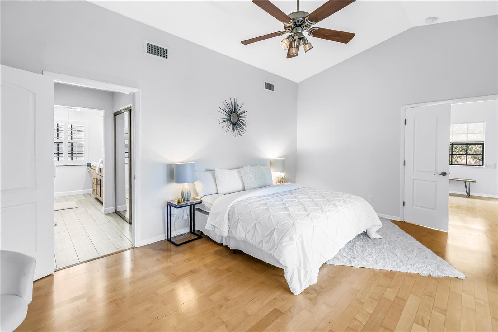 Upstairs Primary Bedroom is private and spacious with en suite luxury bath - 1092 SANABEL CT NE, ST PETERSBURG