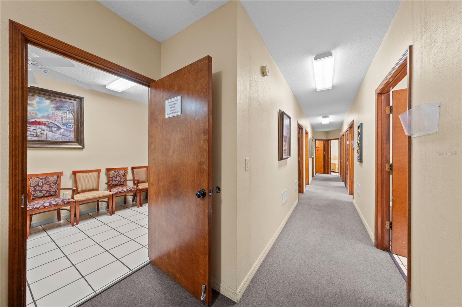 323 W. Cypress St. - hallway leading to exam rooms - 323 W CYPRESS ST, KISSIMMEE