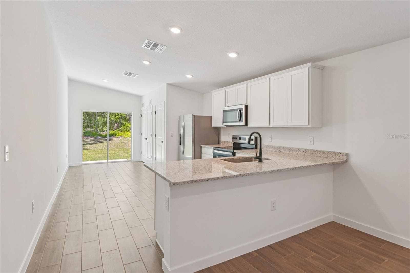 Single Family Residence at 14133 CANADA GOOSE RD, WEEKI WACHEE, photo 6 of 16