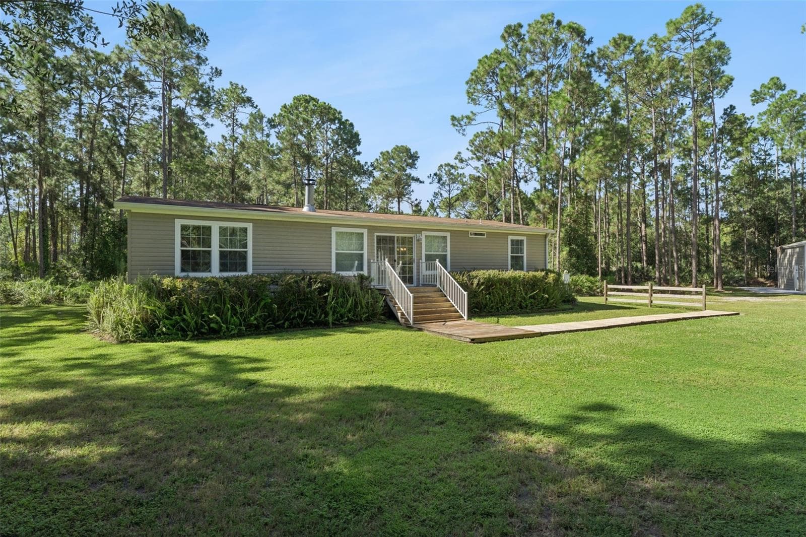 Manufactured Home at 1161 LAKE HARNEY WOODS BLVD, MIMS, photo 19 of 35
