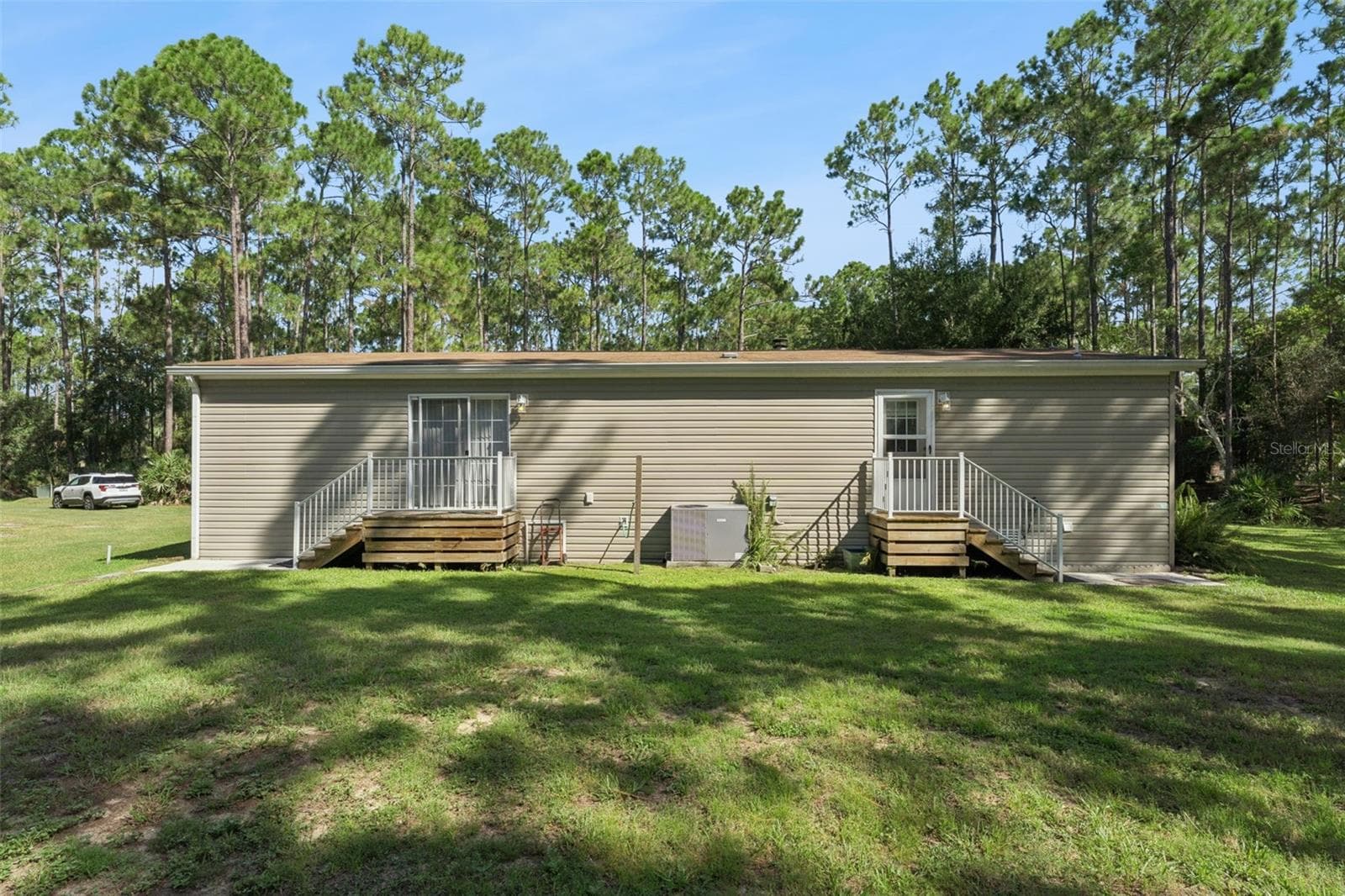 Manufactured Home at 1161 LAKE HARNEY WOODS BLVD, MIMS, photo 20 of 35