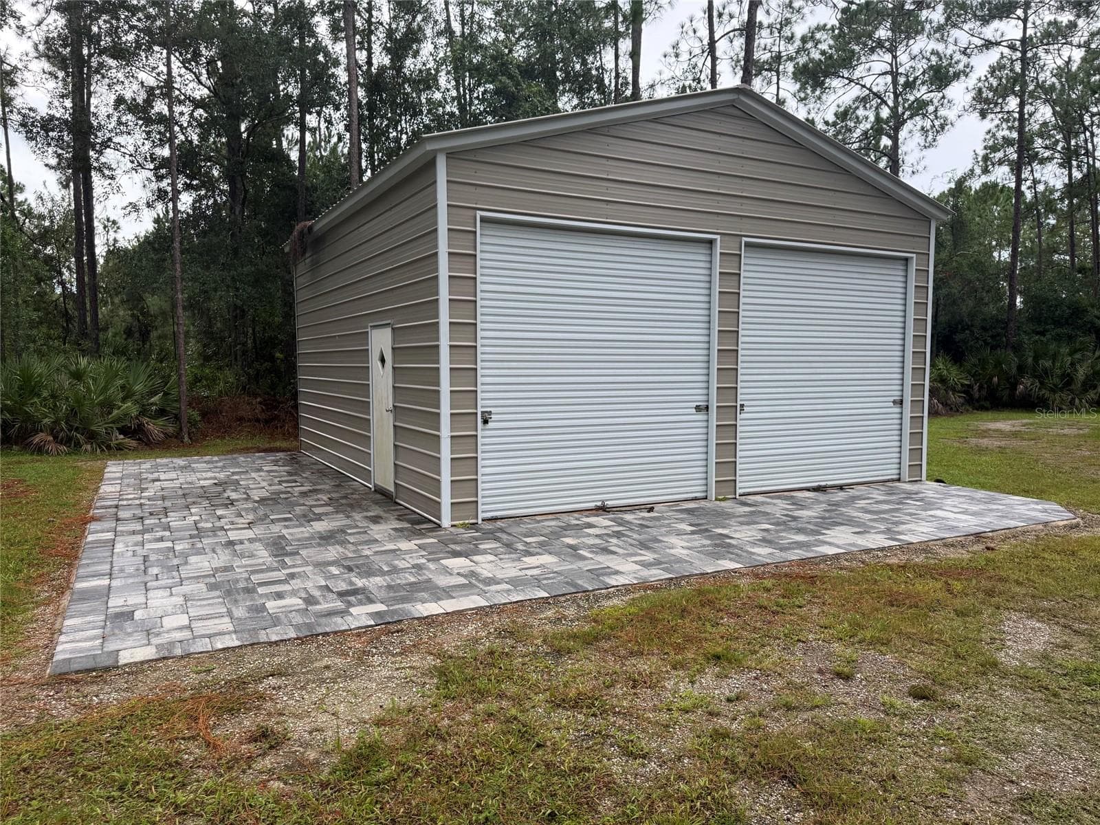 Manufactured Home at 1161 LAKE HARNEY WOODS BLVD, MIMS, photo 31 of 35
